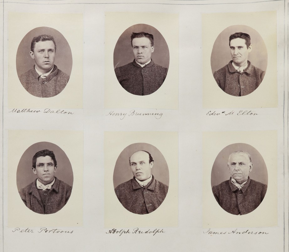 photographs of 6 prisoners in a police album with prisoner names handwritten under each image.