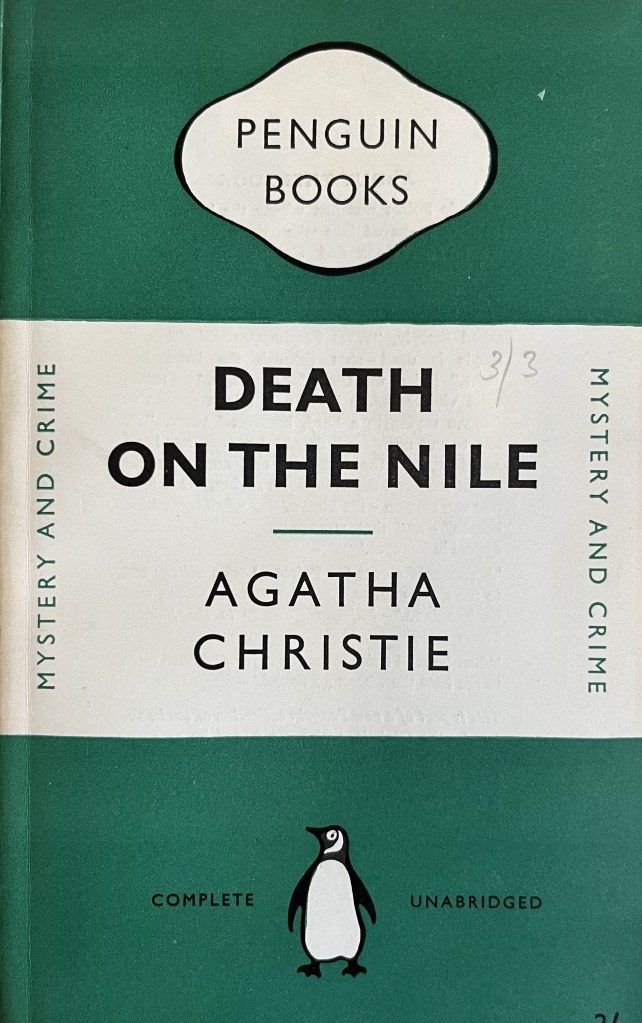 image of 1953 penguin edition of Death on the Nile- green cover with penguin logo and simple title text