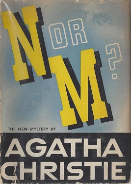 US cover of the book with N or M in large yellow letters on a blue background