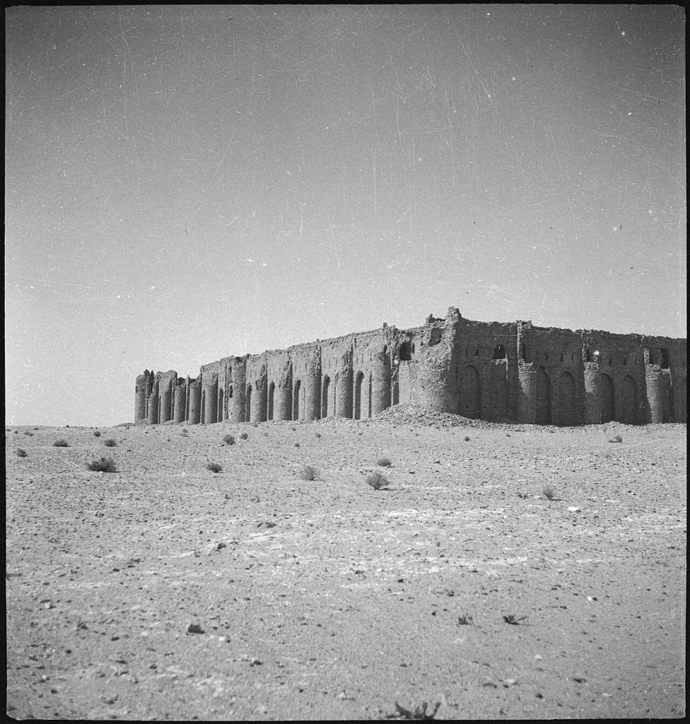 desert scene with historical fort with high walls- black and white photograph.