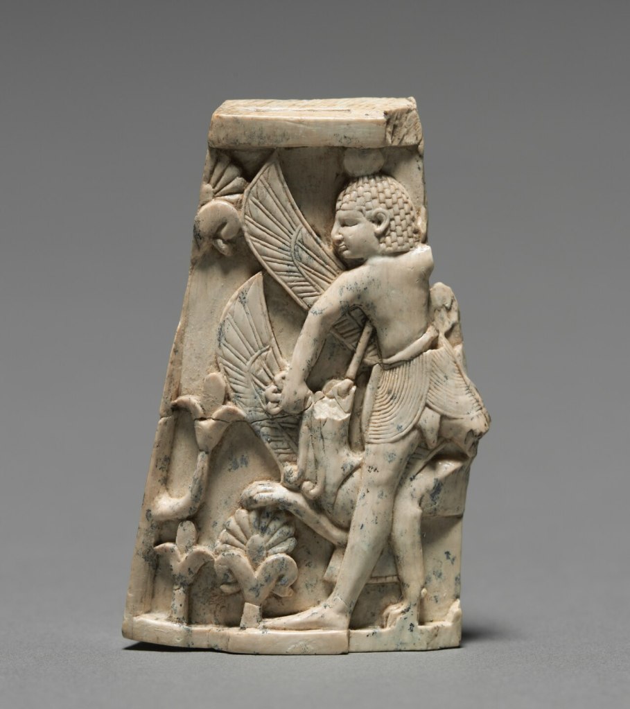 ivory statue showing figure of a man